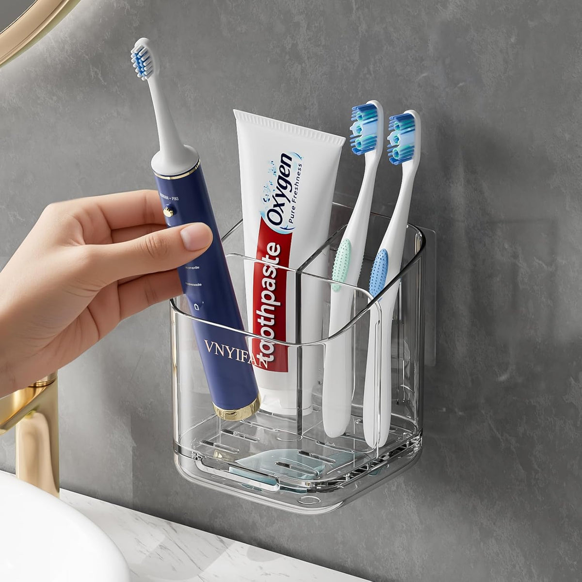 3-slot compartmentalized holder with deep dividers for toothbrush, razor, and toothpaste