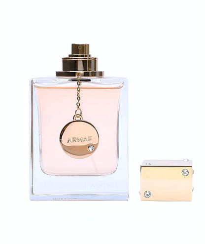 multi-layered fragrance pyramid: citrus top notes (orange, bergamot, grapefruit, peach), floral heart (rose, jasmine, geranium, litchi), and warm base (patchouli, vanilla, musk, vetiver)
